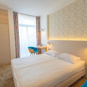 Habitación Estándar con Cama Queen